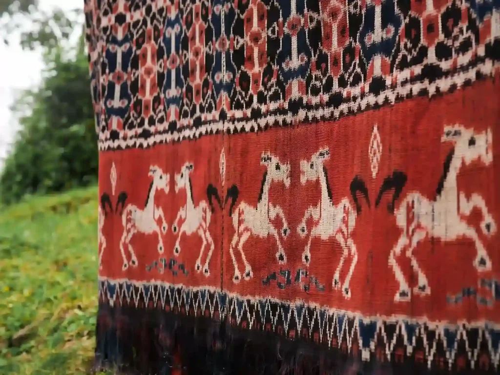 Sumba ikat cloth woven with a row of horse figures