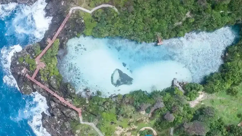 Aerial view of the turquoise Weekuri Lagoon